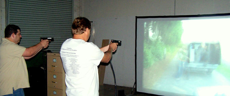 Joel Deutser and Bert Bayhi, members of the 2011 class of the sheriff’s Citizens Police Academy lecture sessions, take aim as they use the firearms simulator while watching a computerized scenario that asks them to decide if it would be justified to shoot a criminal suspect. Call 278-7628 to register for free sessions starting Aug. 29 at Nunez College. 