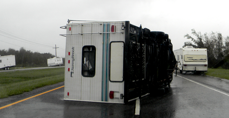 A camper trailer parked inside the hurricane protection levee system at Verret is blown over during the hurricane. 