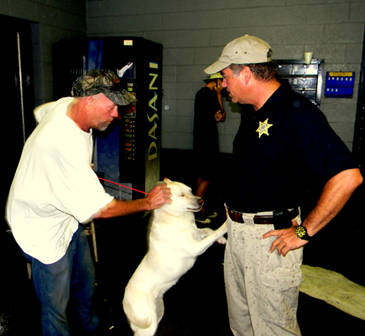   Sheriff James Pohlmann met with people rescued from Plaquemines Parish, shown here talking to Charles Dodds, who brought his dog, Boo Boo.