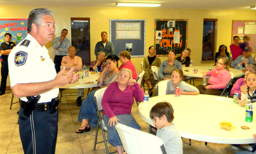 Sheriff James Pohlmann speaks to an audience at the recreation center at the Pentecostal Church in Chalmette.