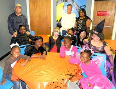 The mentoring group The Girls' Circle had a Halloween party on Saturday, Oct. 27, with guests Sheriff James Pohlmann, standing in back to the left, and Parish President David Peralta, who is standing next to Tiara Howlett, founder of the group. Members of The Girls' Circle, include: seated from left, Rayana Stewart, Zakiya Clark, Taylor Breaud, A'miyah Jones, and back row from left, Anyea Bertrand, Sarah Stanich, Rayana Charles, Ashley Schmiderer and Elena Templet. 