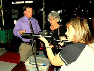 Tina Gioe of Chalmette points a gas gun for firing tear gas during a demonstration  of Sheriff’s Office weapons to the Citizens Police Academy class.