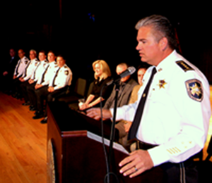 Sheriff James Pohlmann speaks to the graduates and their families.