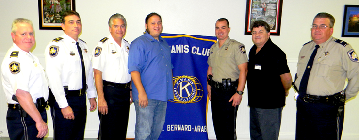 Shown at the Life-Saver Award ceremony are, from left, Maj. Adolph Kreger, Col. John Doran, Sheriff James Pohlmann, Kiwanis Club President Anthony Cole, Deputy Byron Shoemaker who received the Life-Saver Award, Sam Catalanotto, chairman of the Life-Saver committee for the Kiwanis Club; and Lt. Robert Brodhead.