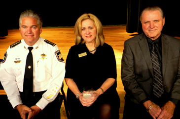 Sheriff James Pohlmann, Crimestoppers CEO Darlene Cusanza and St. Bernard Chief Deputy Sheriff Richard Baumy are shown before the start of the Nov. 14 graduation ceremony for the latest class of the sheriff's Citizen's Police Academy, of which Cusanza was guest speaker at Nunez College in Chalmette.