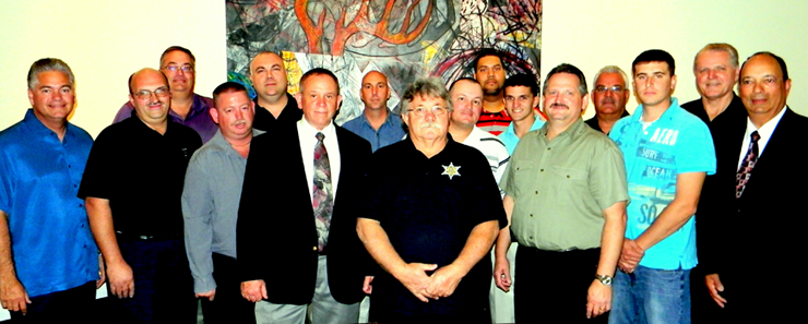 Many of the current members of the St. Bernard Reserve Division are shown at a recent department appreciation dinner with Sheriff James Pohlmann, left, and other rank from the regular force. Included, from left, are the sheriff, Reserve Division Capt. Joe Ricca and Sgt. Mitch Perkins, regular force Capt. Bret Bowen, reserve Deputies Scott Bowles, David Hamburger, Chris Palazzalo, Albert Loar, Lt. Tony Jeansonne, Lathaniel Jackson, Corey Gonzales, Keith St. Germain, regular force Maj. Mark Poche, reserve Dep. Casey Brown, and regular force Chief Deputy Richard Baumy and Capt. Charles Borchers. At the dinner, reserve deputies received gift certificates donated by Cenurion Law Enforcement Supply of Chalmette and Vinson Law enforcement Supply of St. Tammany Parish.