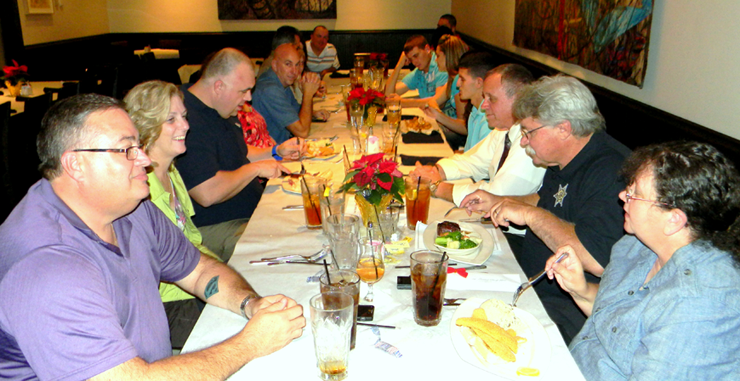 Reserve Division deputies and guests are shown at a table during the appreciation dinner.