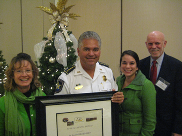 Sheriff James Pohlmann accepts an award from Arc on behalf of the department. Shown with the sheriff are Arc volunteer Polly Campbell, Kristi Andre, who is site director for the Arc Center in Chalmette; and Cliff Doescher, Arc Executive Director. Photo provided by Arc.