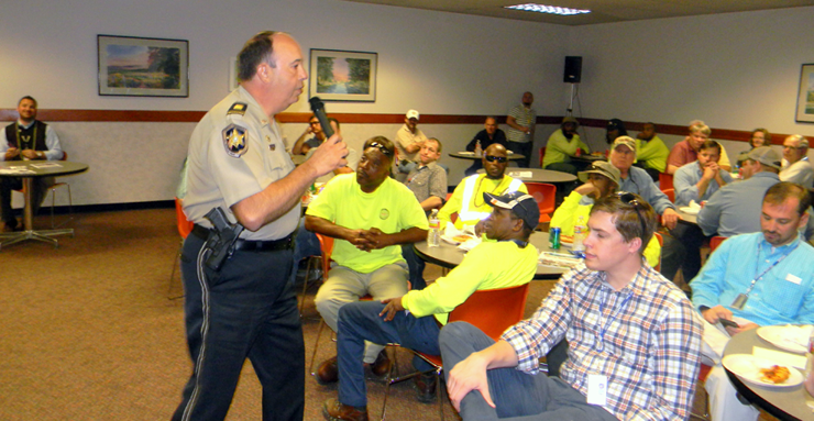 Charles Borchers addresses some of the employees at Jacobs Technology at the Michoud Assembly Facility in eastern New Orleans, where he to spoke about parade safety at their Mardi Gras luncheon.