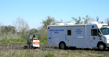 New Orleans police working the investigation of a missing person case used the command center shown to secure a site in eastern St. Bernard until excavation efforts took place Tuesday, which resulted in the finding of a man's body.buried several feet in the ground. The command center was supplied by parish government in cooperation with the St. Bernard Sheriff's Office. 