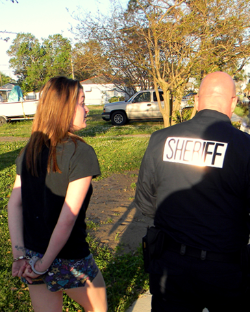 Capt. Ronnie Martin arrests Alexis Eady of Chalmette at her residence.