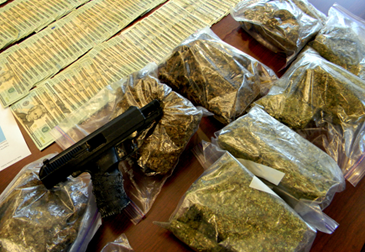 Marijuana, gun, heroin and cash seized in a Chalmette's couple's home. 