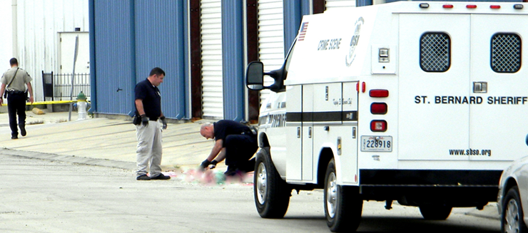 St. Bernard Parish sheriff's detectives process the scene of the murder early Sunday. 