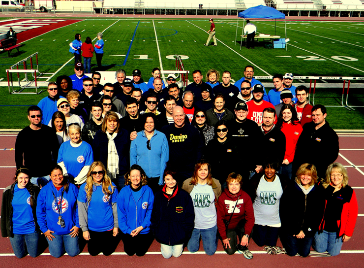 Volunteers from numerous St. Bernard businesses and other groups including the Sheriff's Office who helped put on the Special Olympics are shown before the event started.