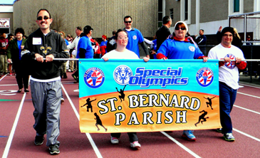 Student participants and volunteers from Chalmette High assisting them are shown. 