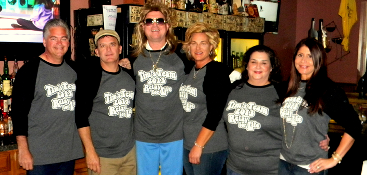 With the Relay for Life event being held April 6-7 in Torres Park, one of the teams involved held a fundraiser at Wimpy's tavern in Chalmette recently for Tim's Team, in memory of Timothy Pritchard Sr. of Chalmette who died last April after a 4-year struggle with cancer. Guest bartenders for the event were, from left, Sheriff James Pohlmann, state District Judge Perry Nicosia, attorney and former Parish Council member Mike Ginart, who is in a wig; Denise Pritchard, widow of Timothy Pritchard; Wimpy's owner Lori Cantrell and Jeanne Juneau, attorney for parish government. 