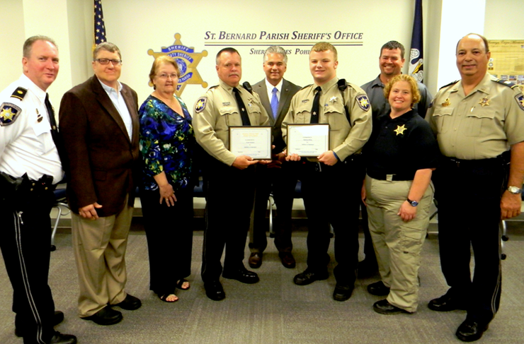 A perfect attendance award for members in the Reserve Division training rcourse recently held was named the "Johnny Huff Always There Award,'' in honor of deceased Sheriff's Deputy Sgt. Johnny Huff, who started as a member of the reserves in the 1970s and became a full-time officer in 1995. Huff family members attended the presentation. Shown, from left, are sheriff's Training Director Maj. David DiMaggio, Dennis Martin, brother in law of Johnny Huff; Kathleen Huff, widow of Johnny Huff; award co-recipient Frank Auderer III, Sheriff James Pohlmann, co-recipient Matthew White, Huff's son and daughter Timothy Huff and sheriff's Capt. Angela Peraza; and Capt. Charles Borchers, commander of the Reserve Division. 