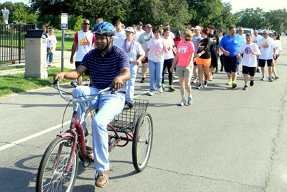 Arc associates used three-wheel bicycles, walked and also ran in the Torch Run.