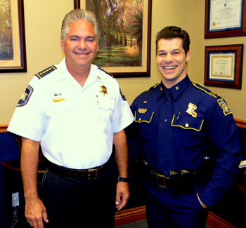 Chalmette native Capt. Donovan Archote, right, the new Commander of State Police Troop B, meets with Sheriff James Pohlmann after talking with the Sheriff's Office command staff.