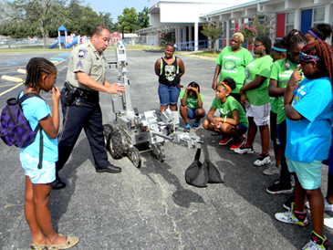 Sgt. Stephen Ingargiola demonstrates the bomb robot used to check out suspicious items.