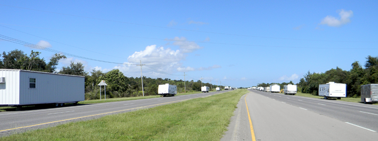 Numerous office trailers and camper vehicles were parked along the highway inside the flood gates at Verret in eastern St. Bernard Parish after their owners removed them from lower lying areas of the parish.	 