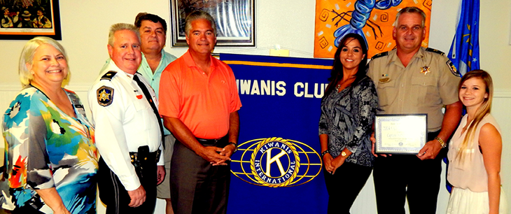 Capt. Walter Dornan, second from right, received the St. Bernard Kiwanis Club Life-Saver Award Sept. 9 for his actions in helping motorists who had been in accidents on the iced-over Paris Road Bridge last January. With him, from left, are Kiwanis Club President Shirley Pechon, Maj. Adolph Kreger, Life-Saver Committee Chairman Sam Catalanotto, Sheriff James Pohlmann, Dornan's wife, Brandy, and Lauren Crain, president of the Chalmette High Key Club which is affiliated with Kiwanis. 