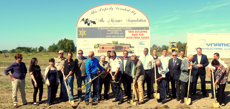 Sheriff Sheriff James Pohlmann holds up a shovel of dirt with others in a ground-breaking ceremony Monday for the new sheriff's sub-station to be built at 4700 Paris Road in Chalmette, being paid for by FEMA as part of three sub-stations being built.