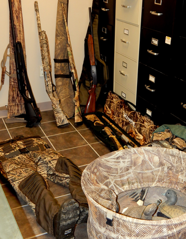 Shotguns, decoys, and a hunting outfilt stolen and recovered.