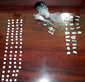 No. 3274: Drugs recovered in Johnson's arrest, including 25 aluminum fails containing heroin, more than 70 Tramadol painkiller tablets and five hits of Ecstasy, or MDMA.